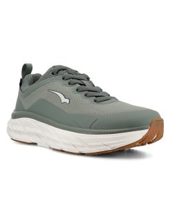 Zector är en grön/benvit, vattentät sneaker designad för hög komfort och daglig användning. Visad snett framifrån.