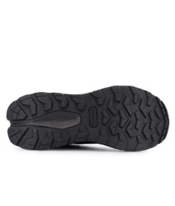 Bagheera walker a black waterproof walking shoe with a quick lacing system in a unisex model. The picture shows the black sole against a white studio background.