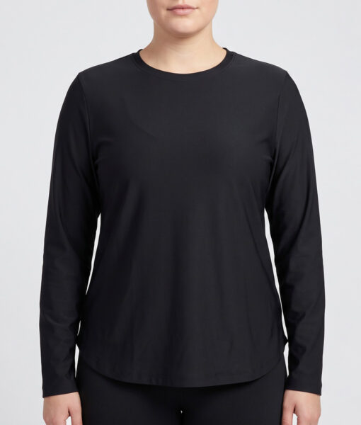 Female model shows off a black Bagheera long-sleeved tracksuit. . The model is shown from the front in a studio against a light gray background.