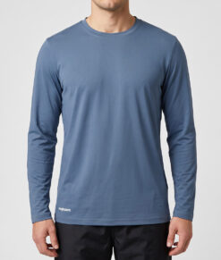 Male model shows off a dove blue Bagheera long-sleeved training shirt. . The model is shown from the front in a studio against a light gray background.